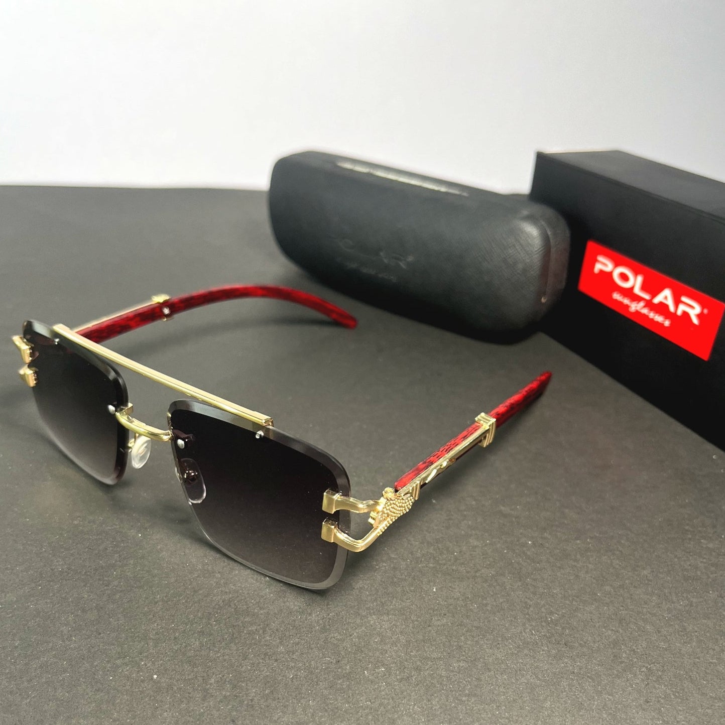 Woodline polarized rimless sunglasses with box.