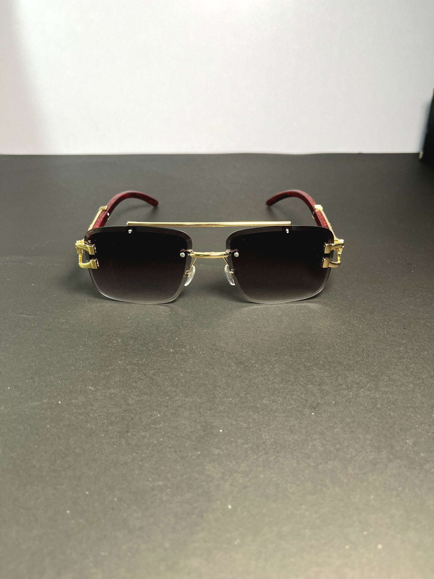 Woodline polarized rimless sunglasses with box.