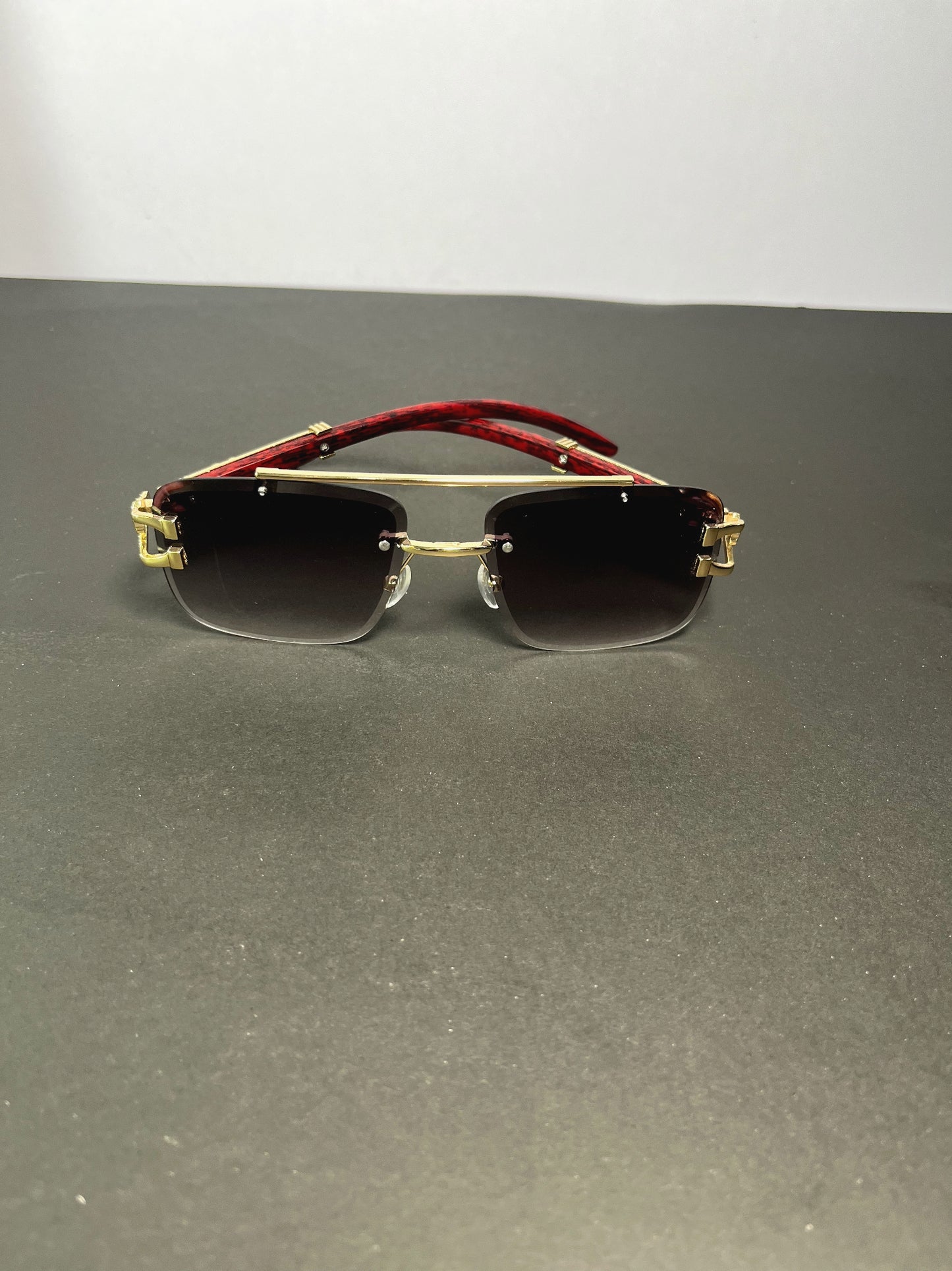 Woodline polarized rimless sunglasses with box.