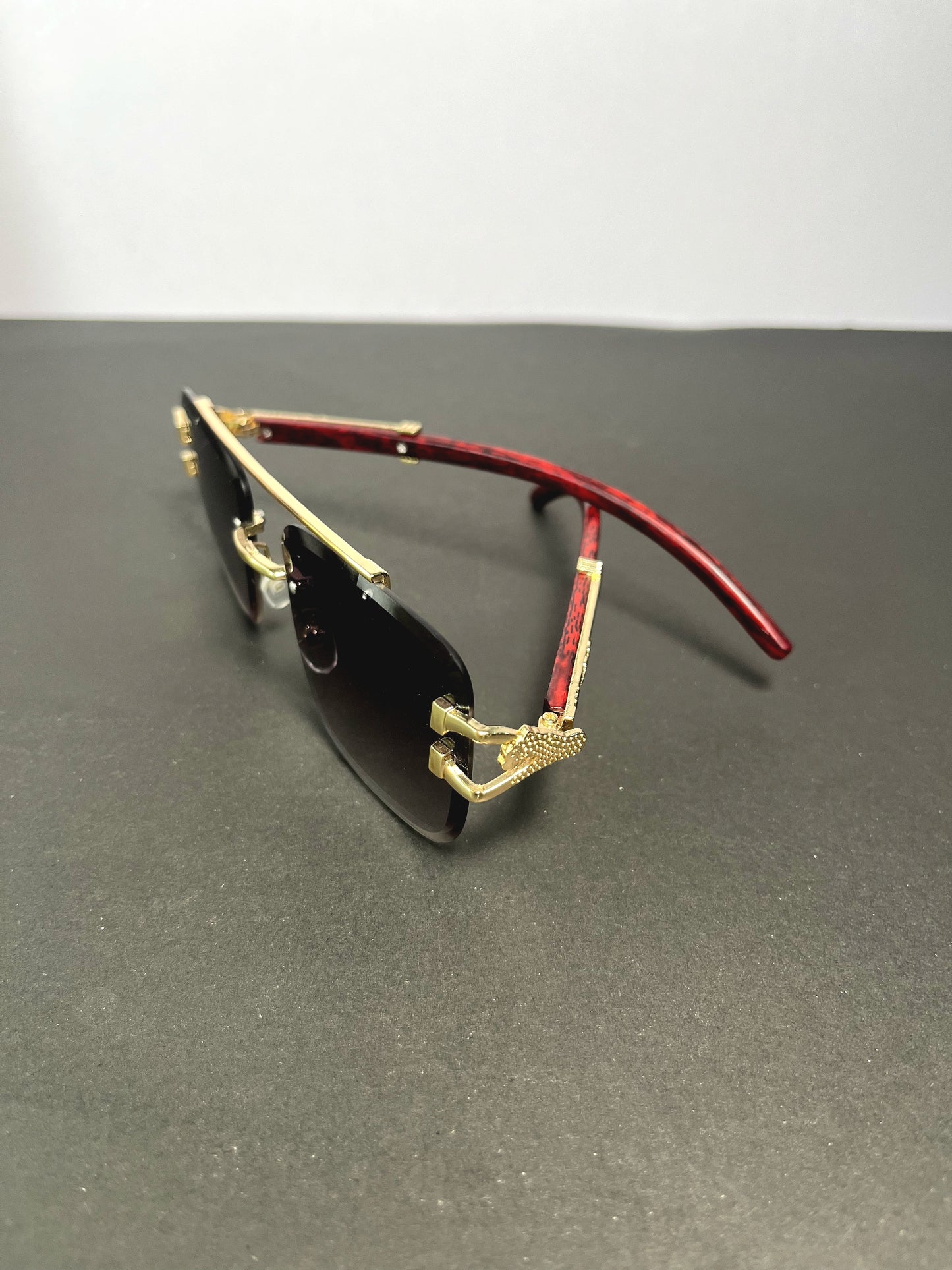 Woodline polarized rimless sunglasses with box.