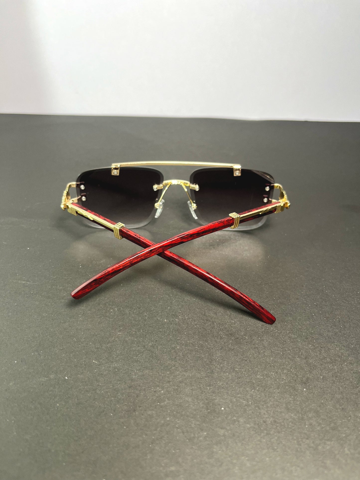 Woodline polarized rimless sunglasses with box.